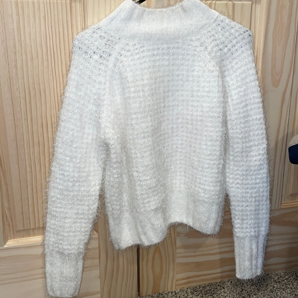White fuzzy sweater